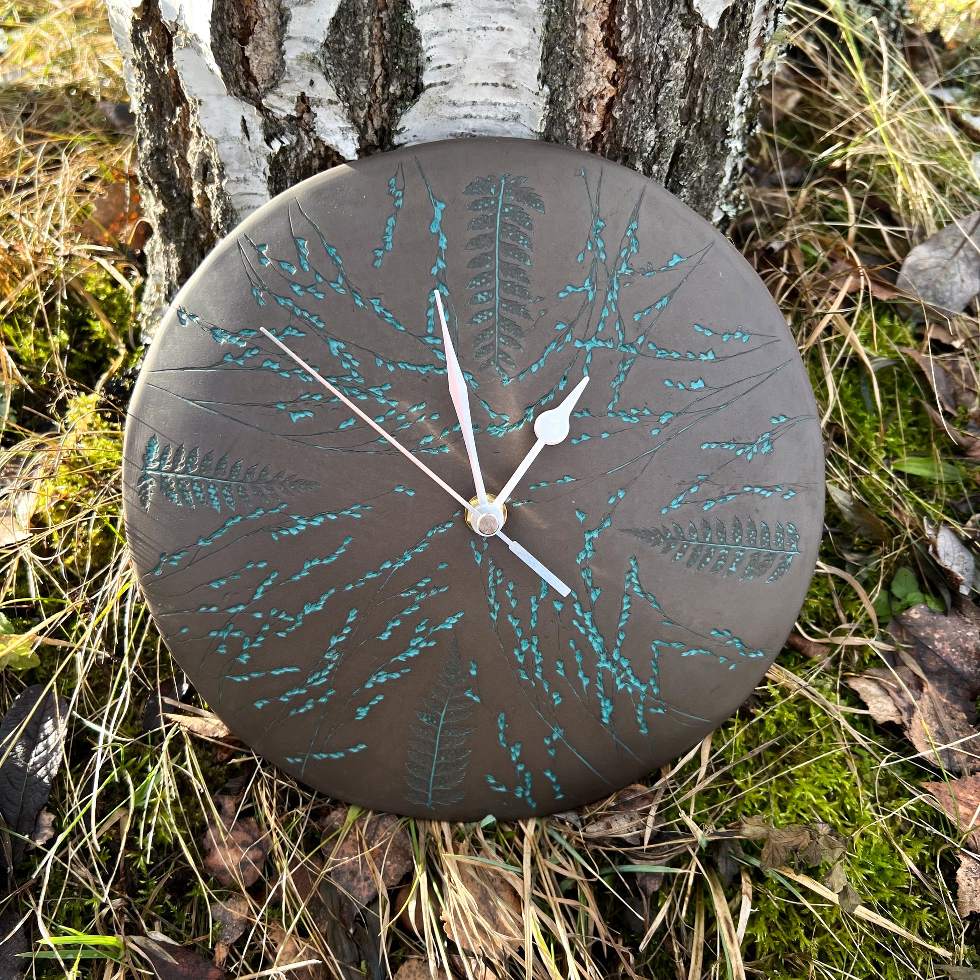 wall clock with grass