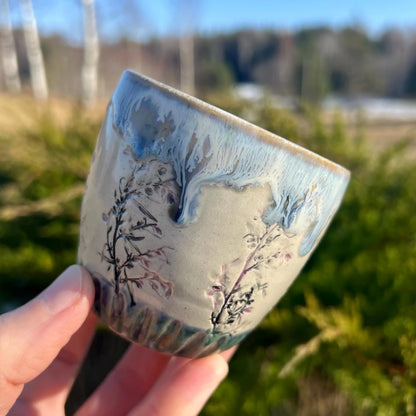 Glāzīte ar ziediem