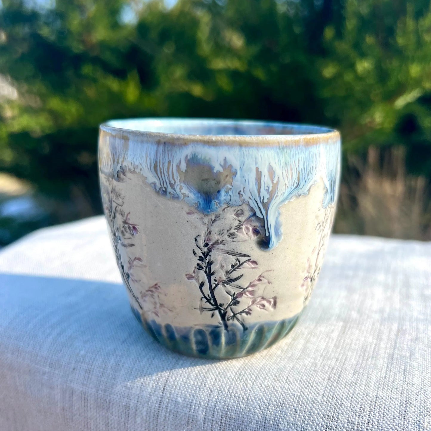 Glāzīte ar ziediem